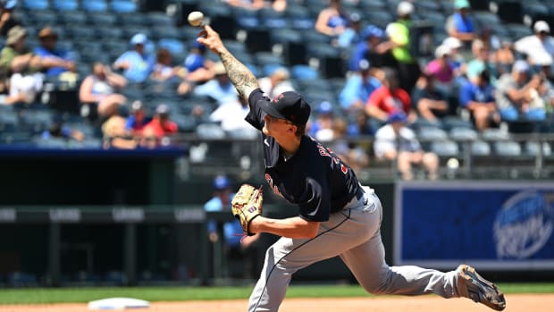 Jul 10, 2022; Kansas City, Missouri, USA; Cleveland Guardians starting pitcher Zach Plesac (34) delivers a pitch during the fourth inning against the Kansas City Royals at Kauffman Stadium. Mandatory Credit: Peter Aiken-USA TODAY Sports